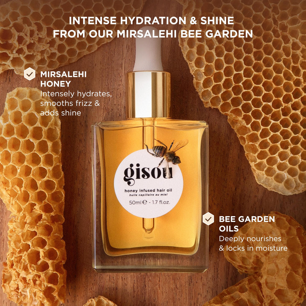 Gisou Honey Infused Hair Oil drops capture emollient hydration for smoother strands.