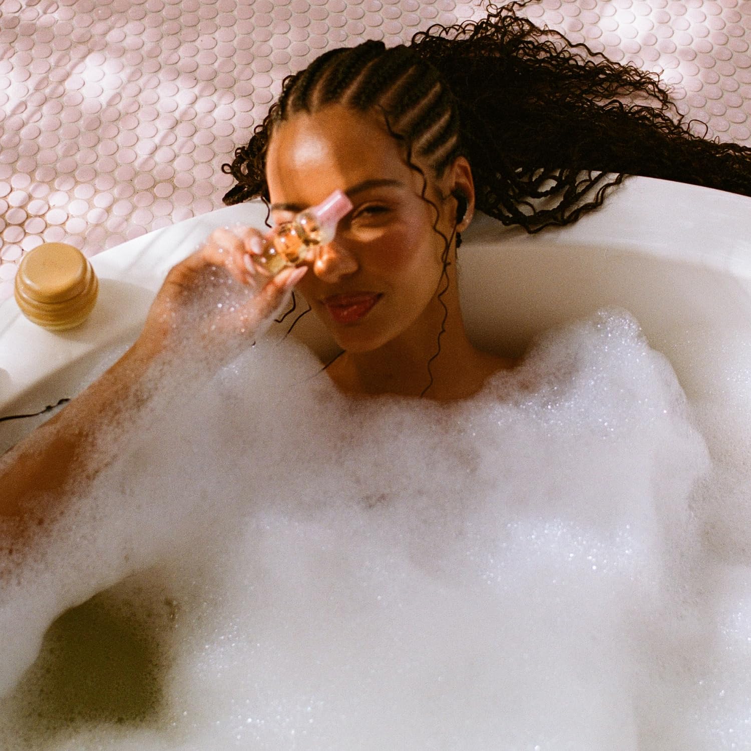 Gisou Honey Infused Hair Perfume honey drop closeup hints at natural honey blend.