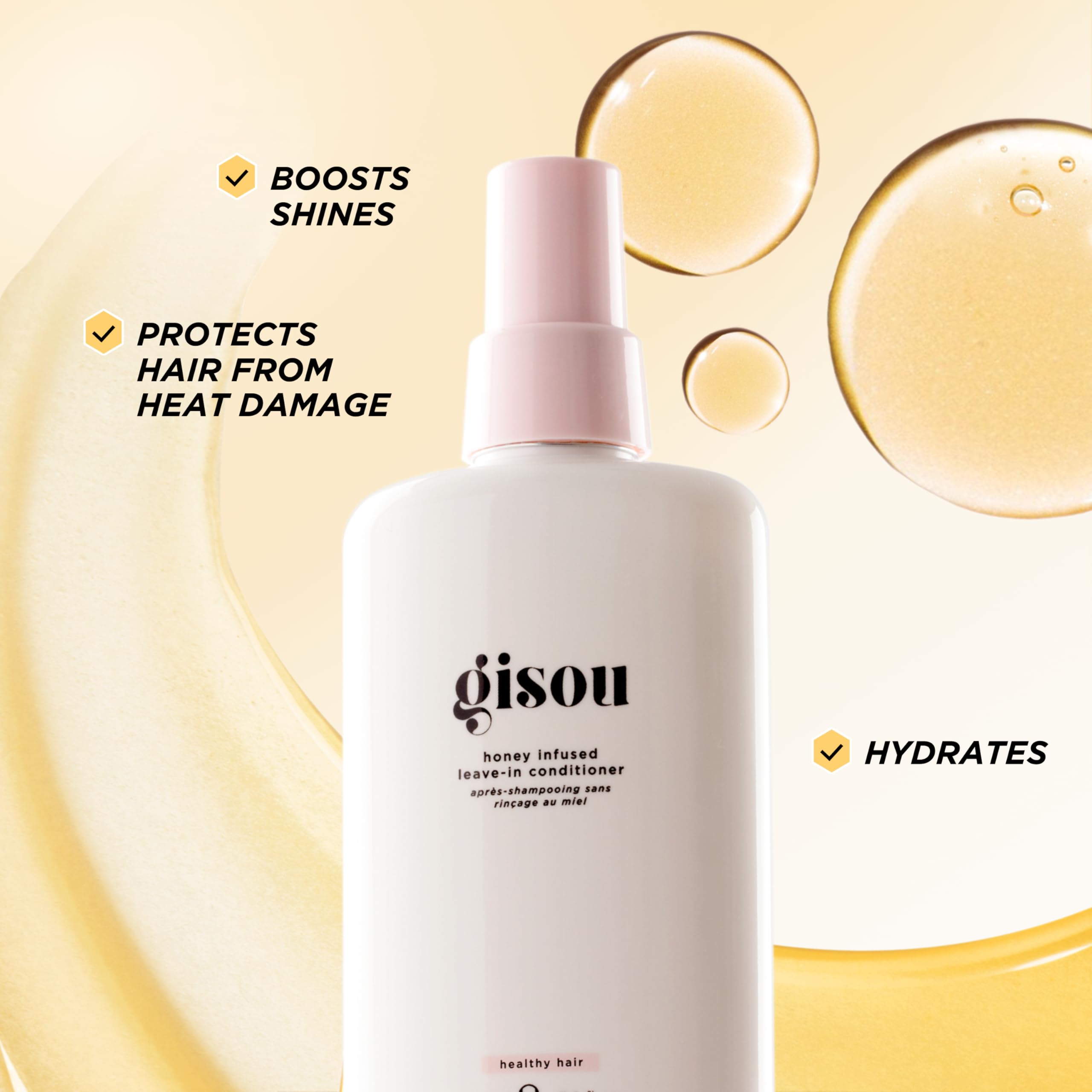 Gisou Honey Infused Leave-In Conditioner pump bottle ready for easy styling prep.