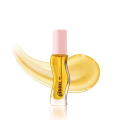 Gisou Honey Infused Lip Oil applicator shown for easy, even application and lasting moisture.