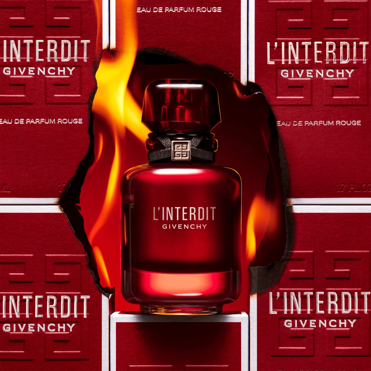 Givenchy L’Interdit Rouge bottle on wrist suggests daily elegance and confidence.