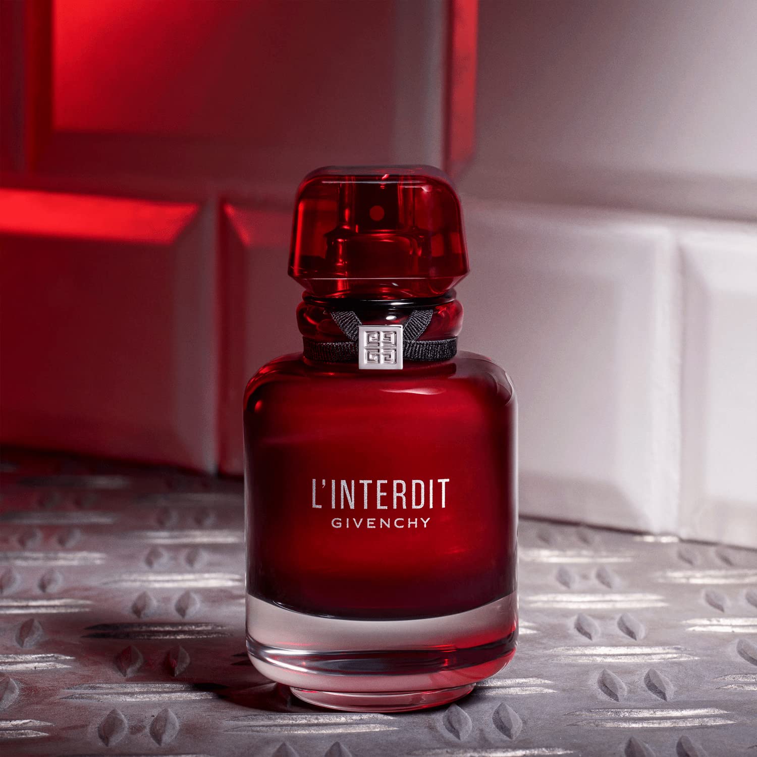 Givenchy L’Interdit Rouge cap closeup reveals luxe detailing and premium packaging.