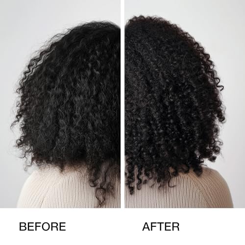 GK Hair shampoo in hand with creamy lather for gentle cleansing