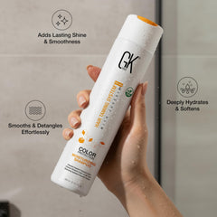 GK HAIR conditioner bottle close-up emphasizing hydrating formula for color-treated hair