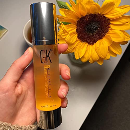 GK HAIR Oil on hand demonstrates quick absorption with non-greasy finish.