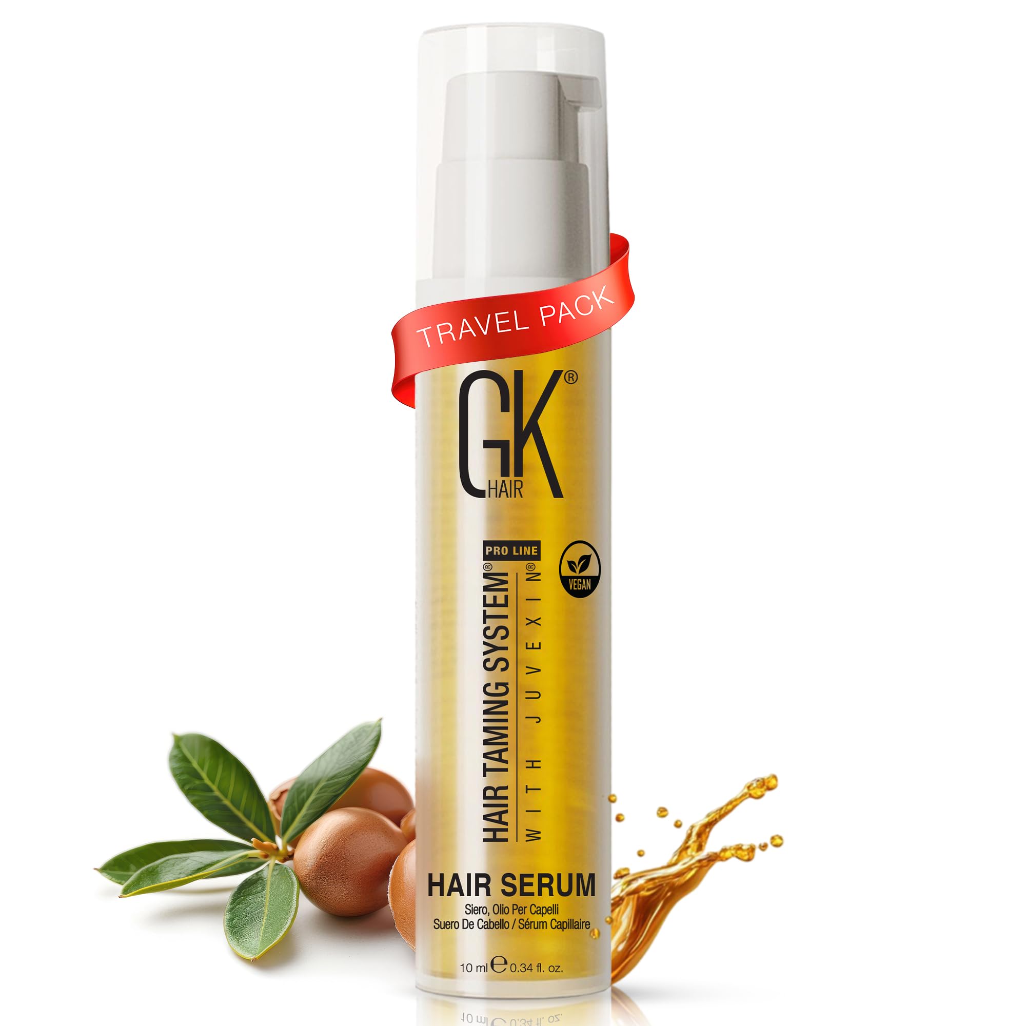 GK HAIR Oil travel-size bottle pouring for frizz control and shine.