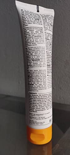 GKhair ThermalStyleHer applied to damp hair demonstrating moisture retention during heat styling.