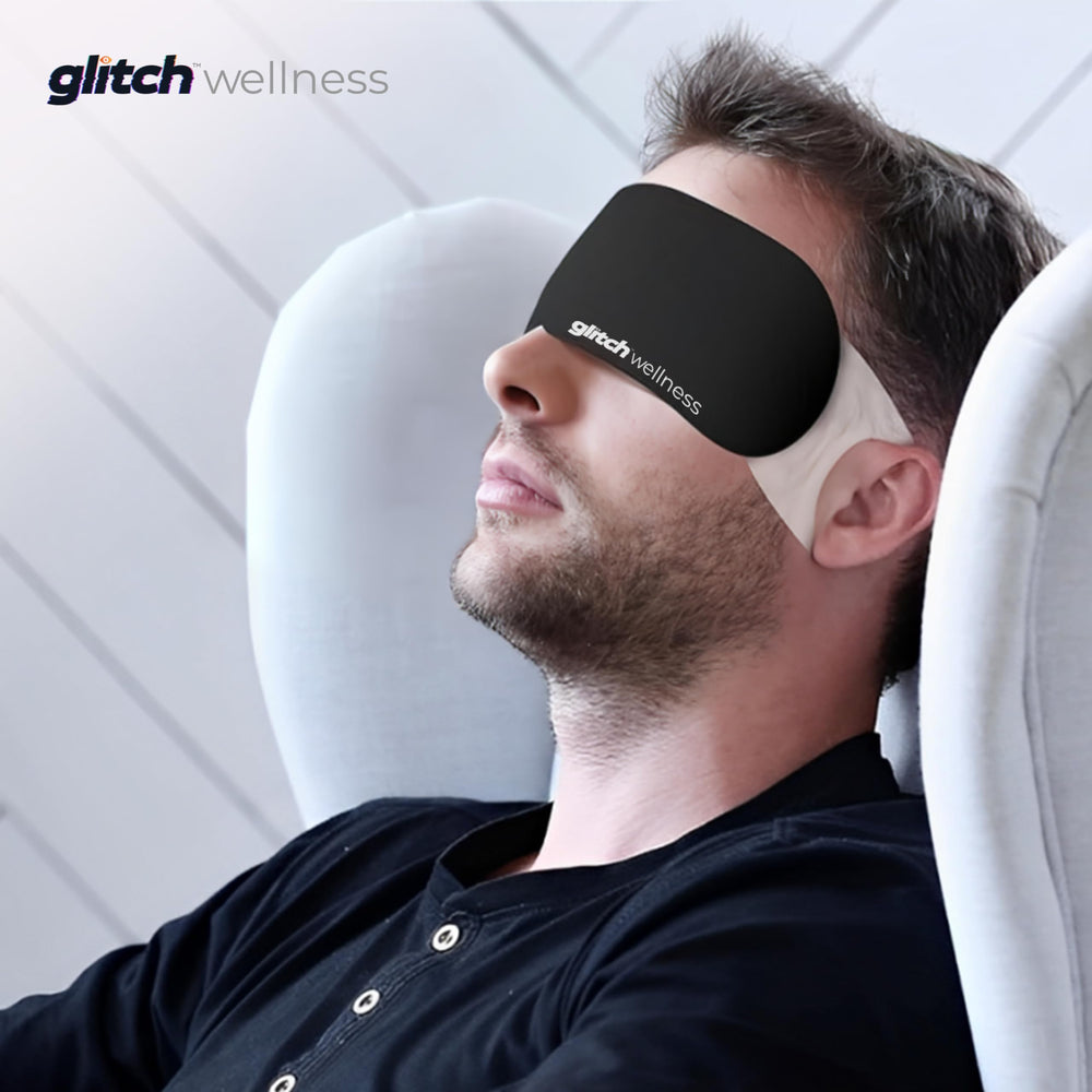Glitch SteamTech Eye Mask on office desk illustrates easy screen-time break.