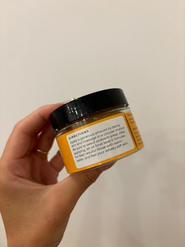 Glo Melanin Turmeric Scrub vitamin-e capsule closeup for antioxidant support.