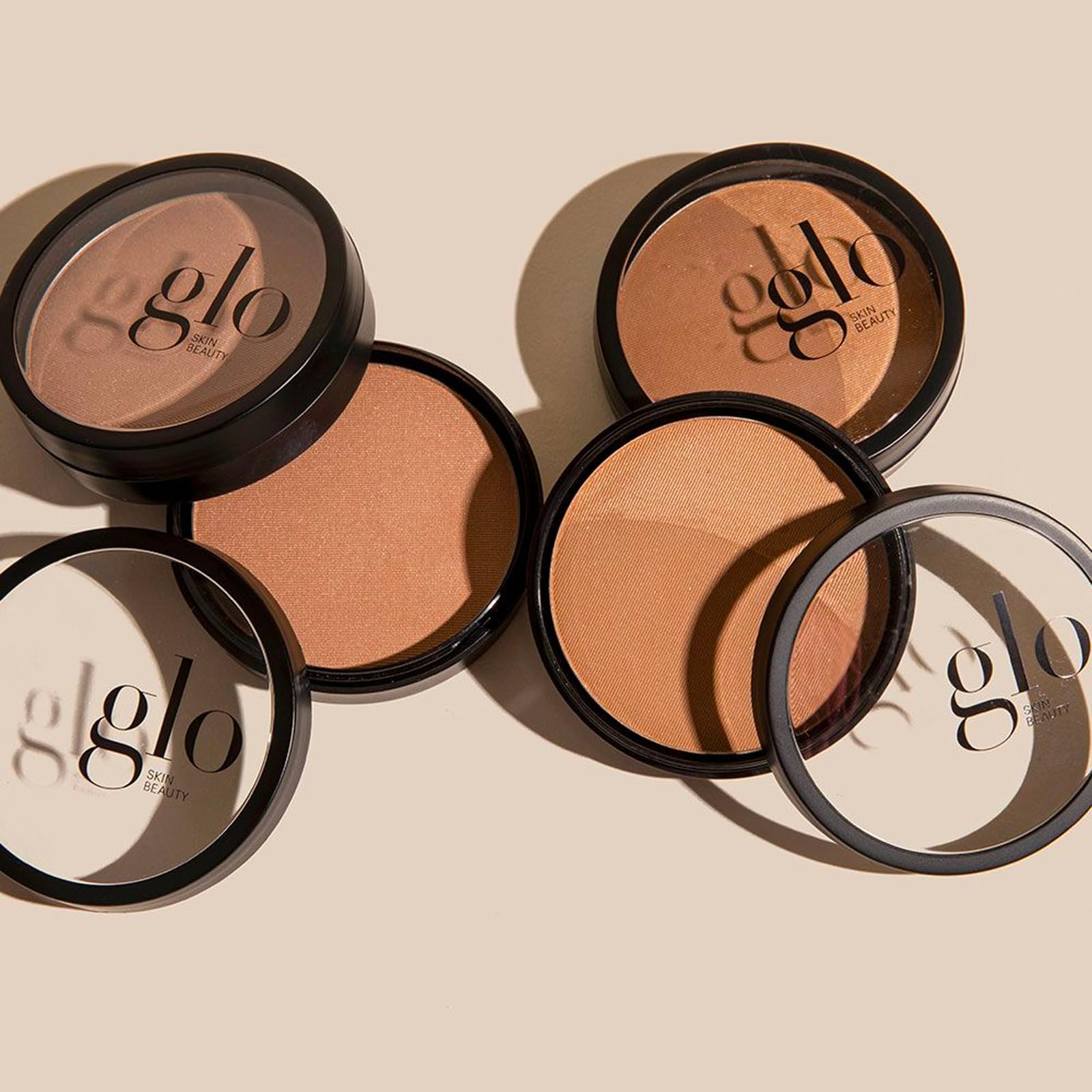 Glo Skin Beauty Bronzer Sunkiss brush-application suggests easy blending for even tone.