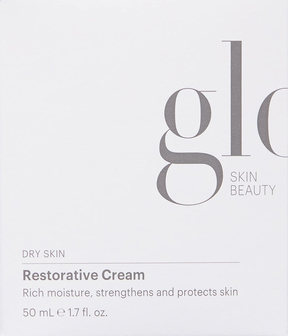 Glo Skin Beauty Restorative Cream swirl on hand conveys rich texture for massage.