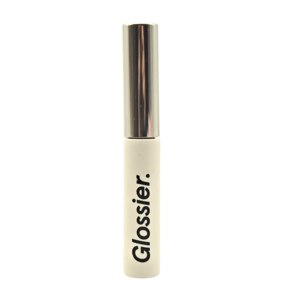 Glossier Boy Brow Clear gel tube close-up showing precision brush for defined brows.