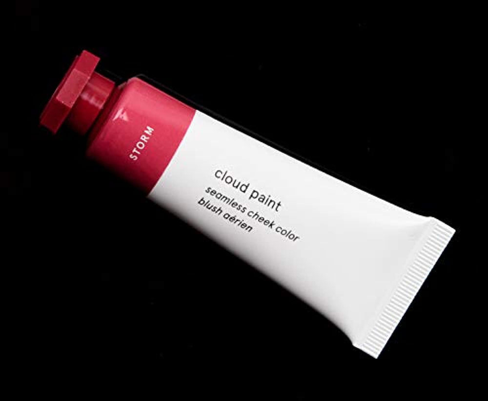 Glossier Cloud Paint Storm close-up bottle shows creamy, buildable blush for natural flush.