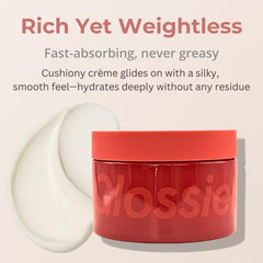 Glossier Crème de You jojoba oil droplet highlighting hydrating touch.