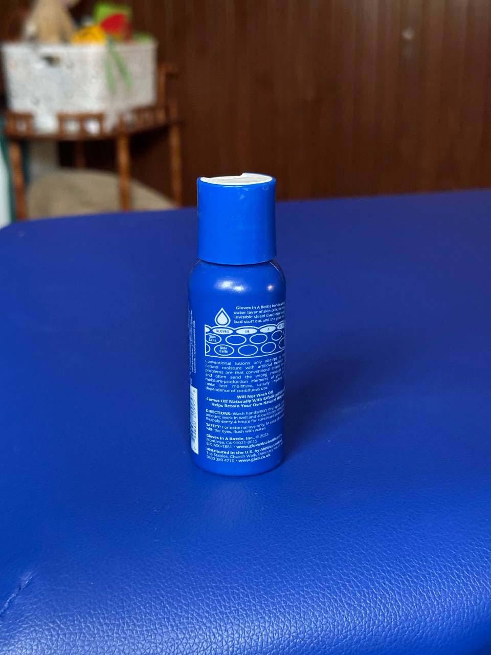 Gloves In A Bottle dry-hands application closeup shows intense hydration and soothing texture.