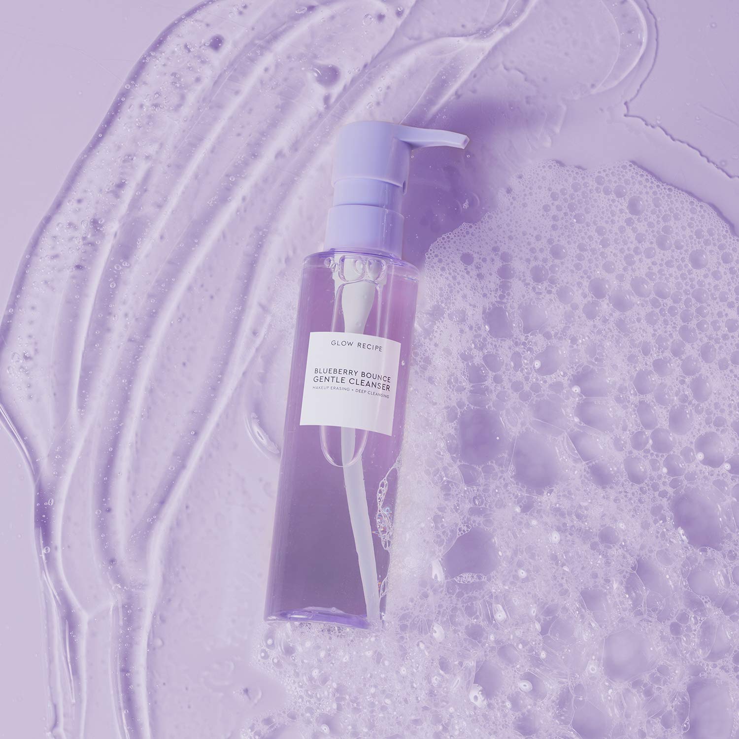 Glow Recipe Blueberry Bounce Face Wash bubbles illustrate gentle exfoliation for smoother pores.
