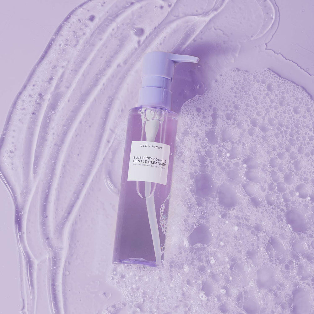 Glow Recipe Blueberry Bounce Face Wash bubbles illustrate gentle exfoliation for smoother pores.