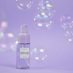 Glow Recipe Blueberry Bounce Face Wash foaming lather demonstrates gentle makeup removal.