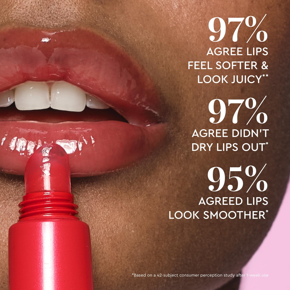 Glow Recipe Glass Balm sheer-pinky-red tint on lips for a plump-looking gloss.