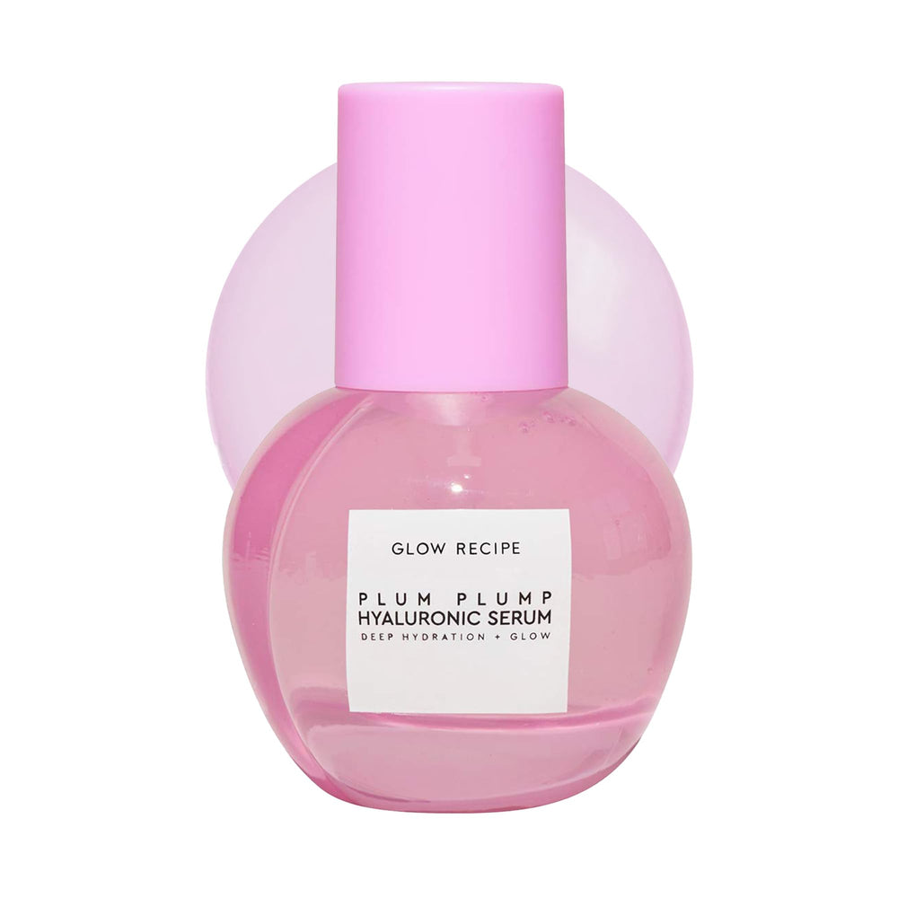 Glow Recipe Plum Plumping Serum bottle pouring for lightweight hydration and glow.