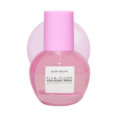 Glow Recipe Plum Plumping Serum bottle pouring for lightweight hydration and glow.