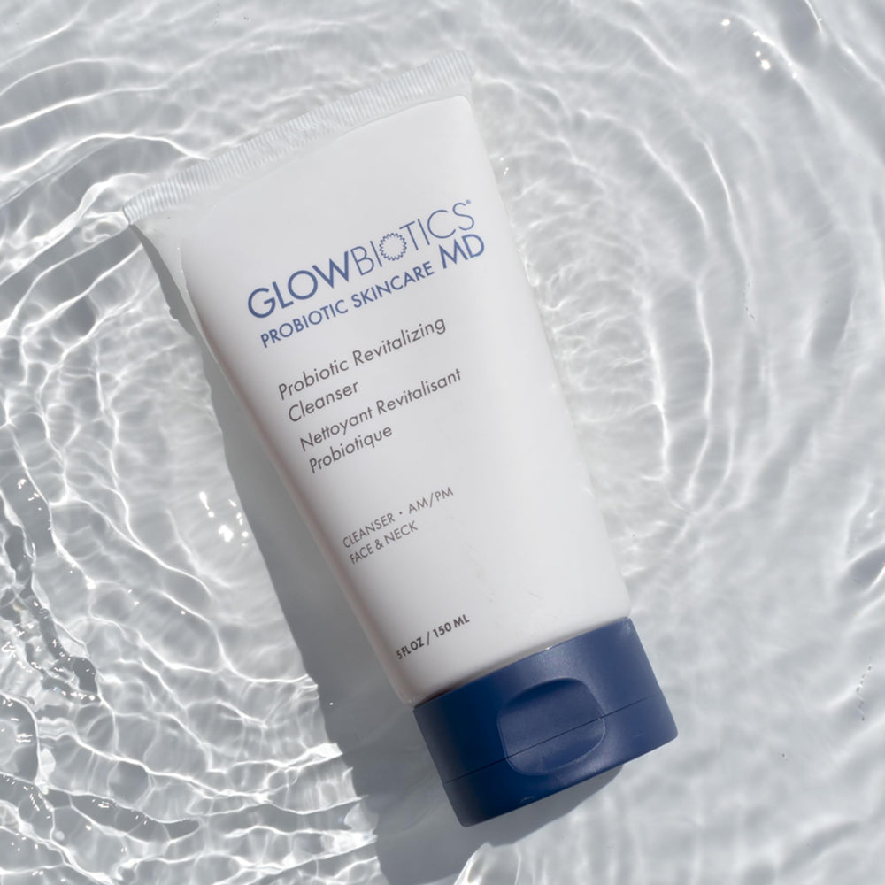 Glowbiotics probiotic cleanser face closeup emphasizing aloe vera and peptides for calm skin.