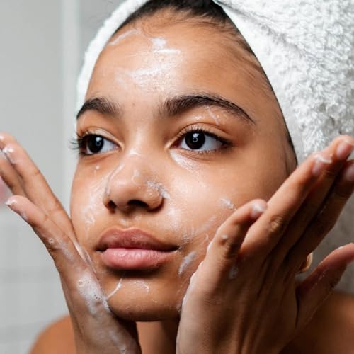 Glowbiotics probiotic cleanser massage-application capturing soothing facial massage experience.