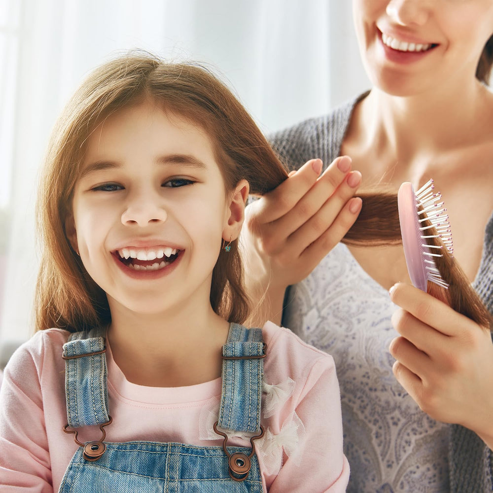 Goiio soft bristles on wet hair for smooth detangling and care