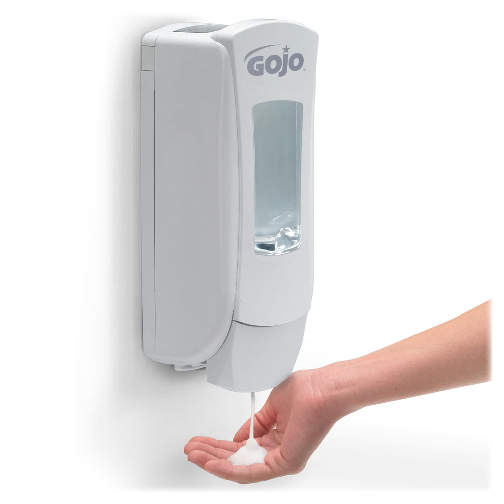 GOJO dispenser with drip-free rinse and clean sink benefit in use.