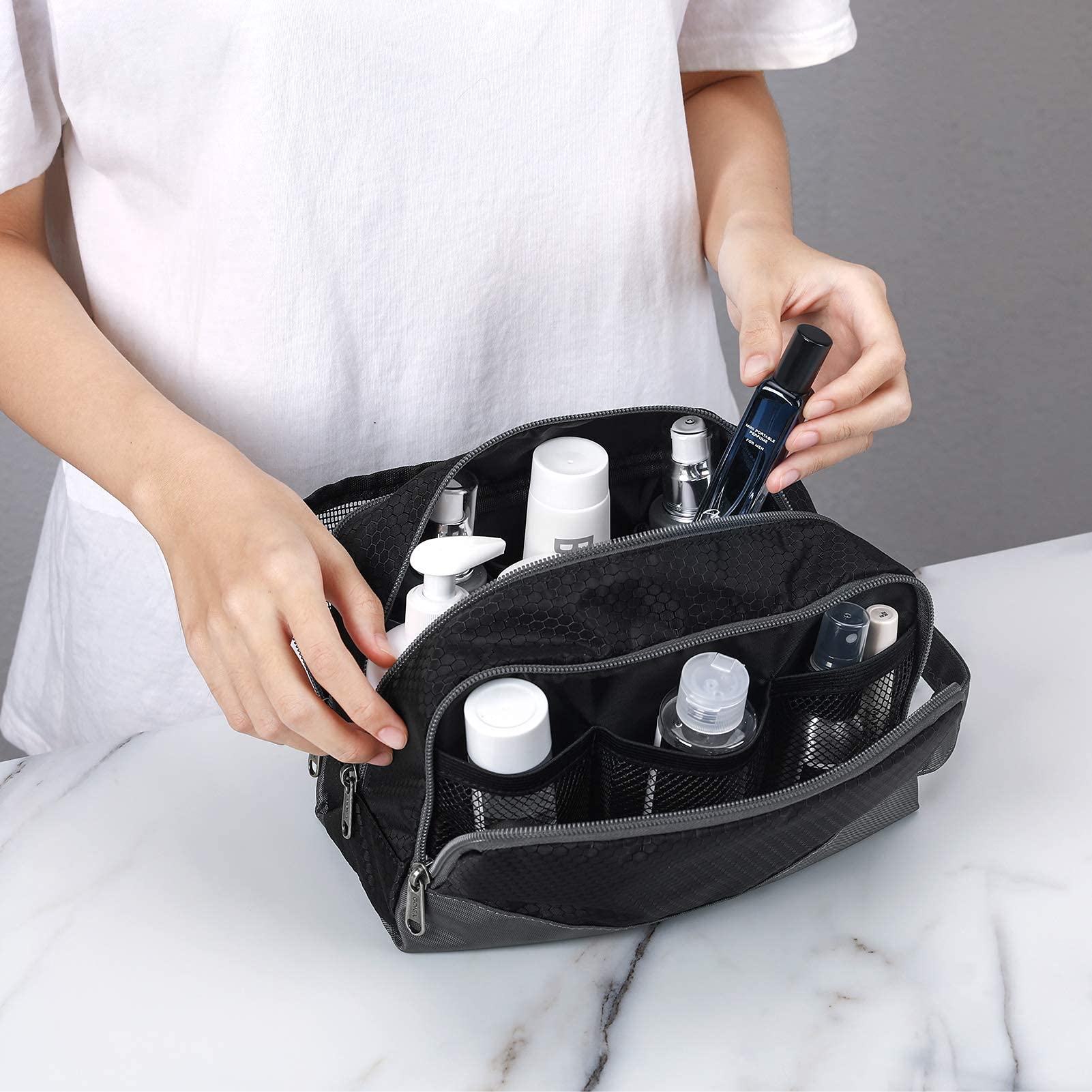 Gonex front-pocket detail adds extra storage during trips.