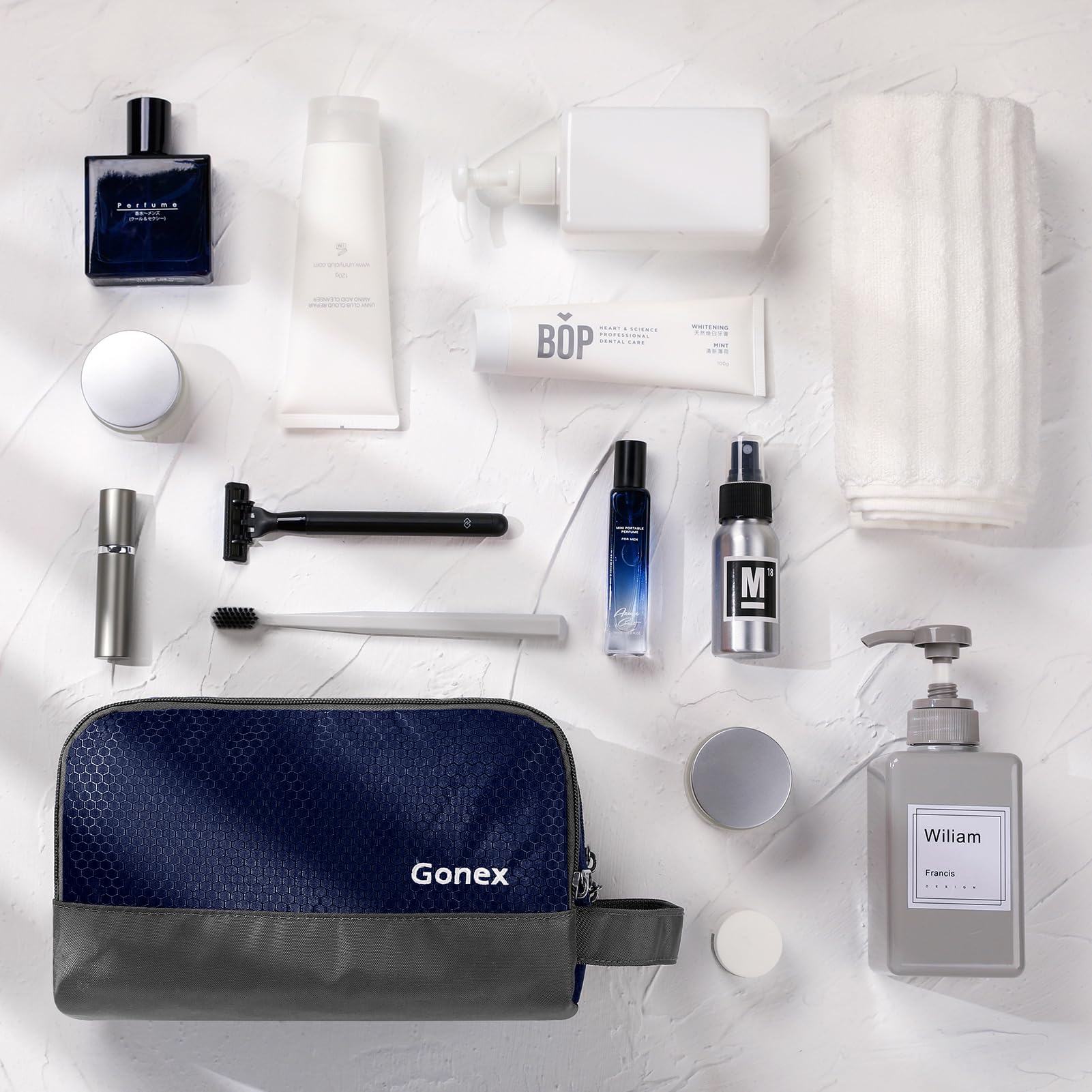 Gonex travel toiletry bag inside a suitcase, showing organized packing.