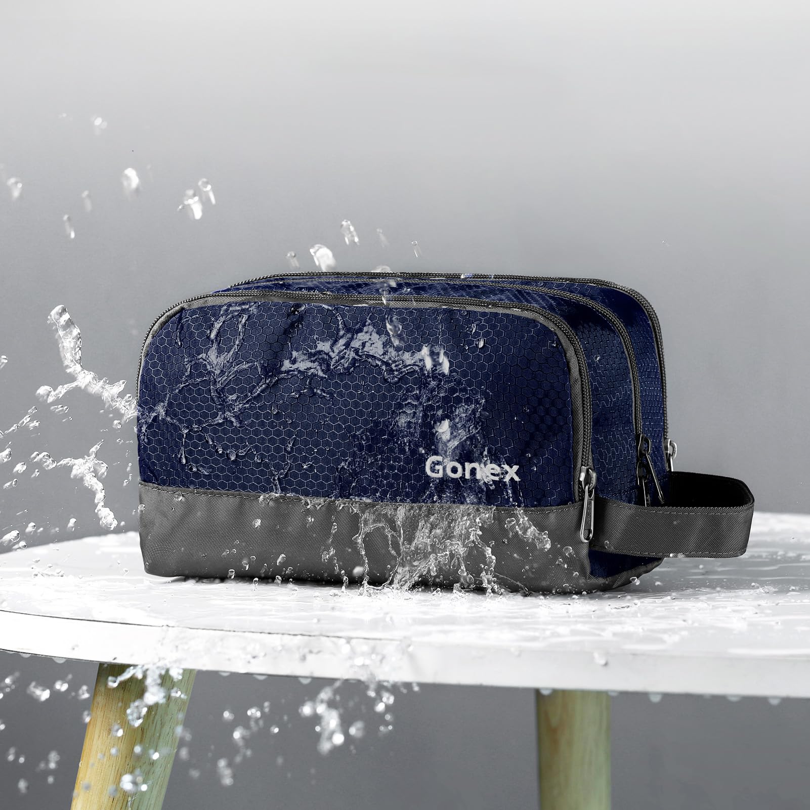 Gonex travel toiletry bag main compartment holds larger bottles for trips.