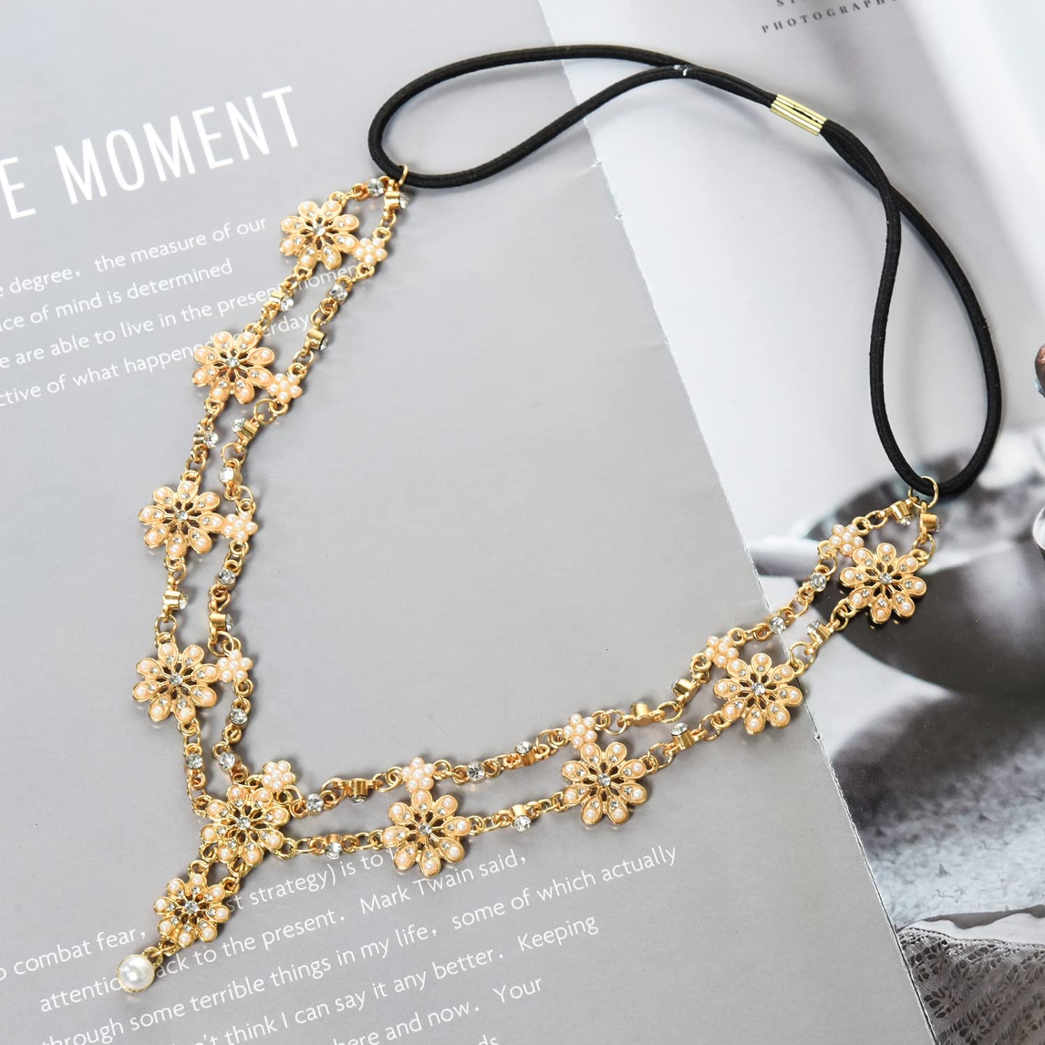 Gonioa center pendant anchors the jewelry to focal point.