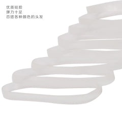 GOODY clear elastic closeup showcasing transparent hold for versatile styling.