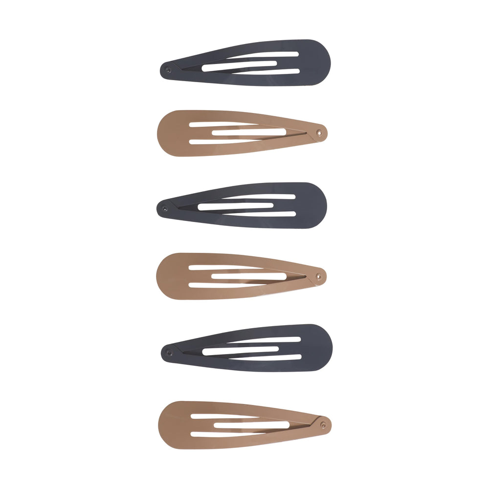 Goody neutral colors collection flat lay for versatile styling