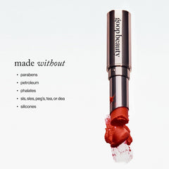 goop Beauty Lip Balm Tomato swatch, clear-red tint for subtle color