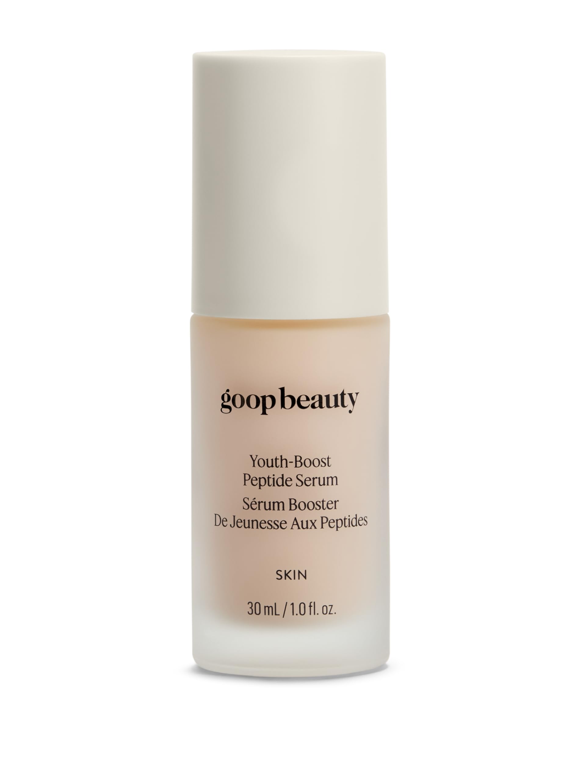 Goop Beauty Peptide Serum bottle closeup showcases hydrating texture for smoother, more radiant skin.