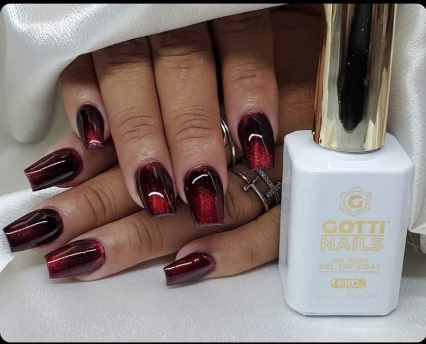 Gotti Nails Gel Top Coat Non-Yellowing finish preserves true nail color over time.