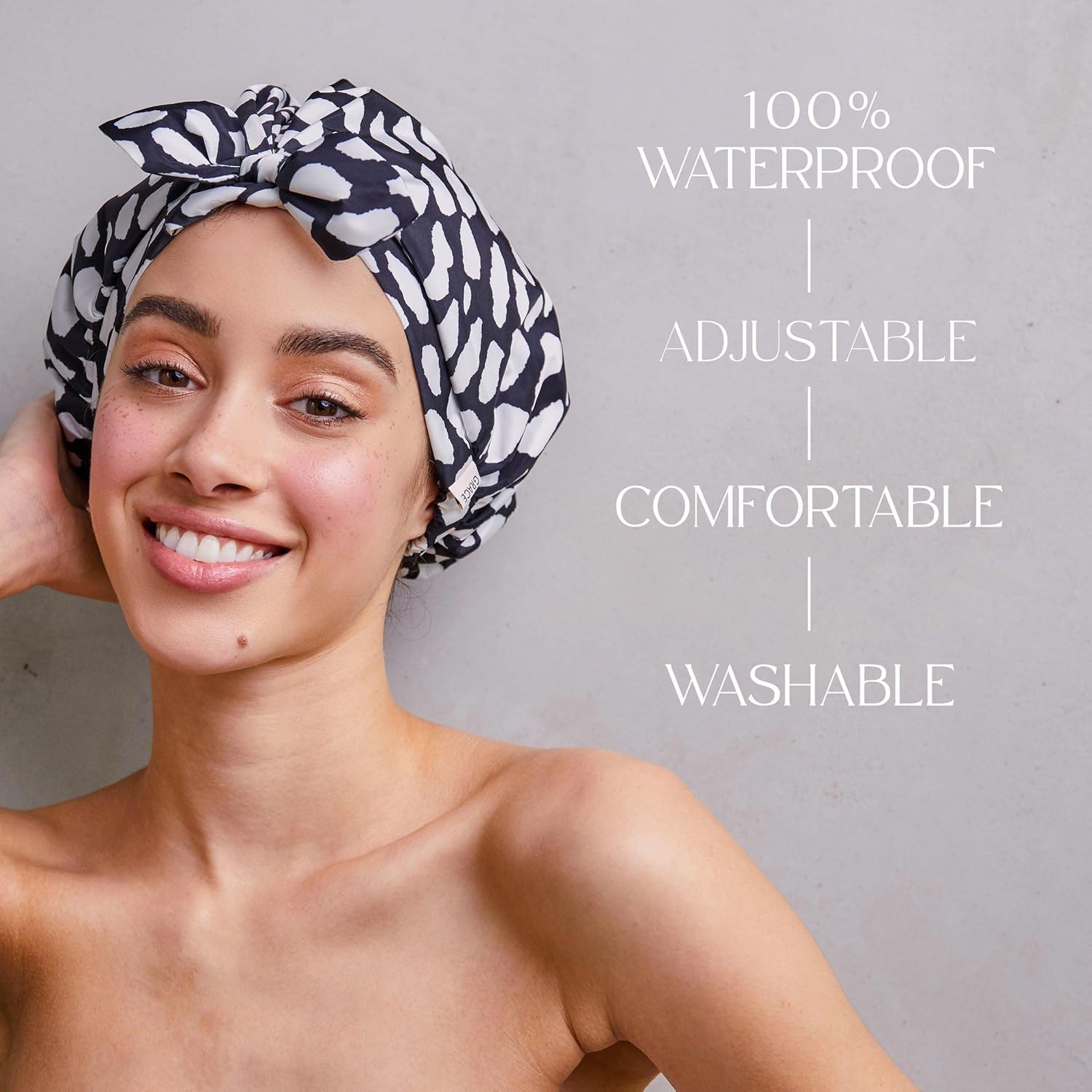 GRACE & COMPANY Casablanca model wearing cap—hair stays dry during humid showers.
