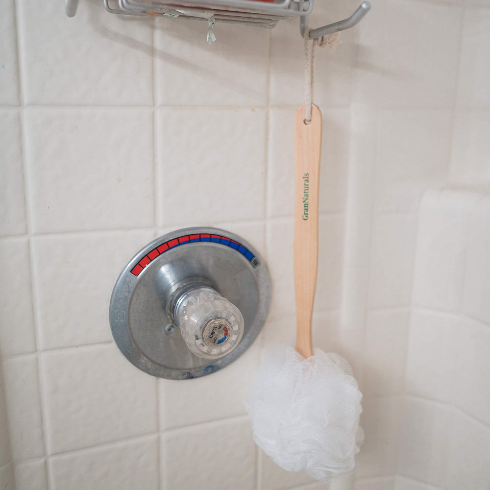 GranNaturals long wooden handle design supports reach and comfort during showers.