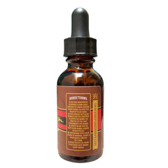 Grave Before Shave Cigar Blend Beard Oil dropper shows easy application and conditioning.