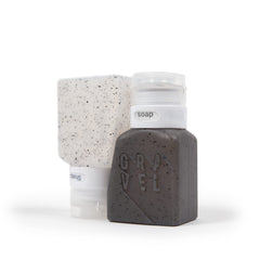 Gravel 3oz travel bottles front view showing compact TSA-friendly design for easy airport packing