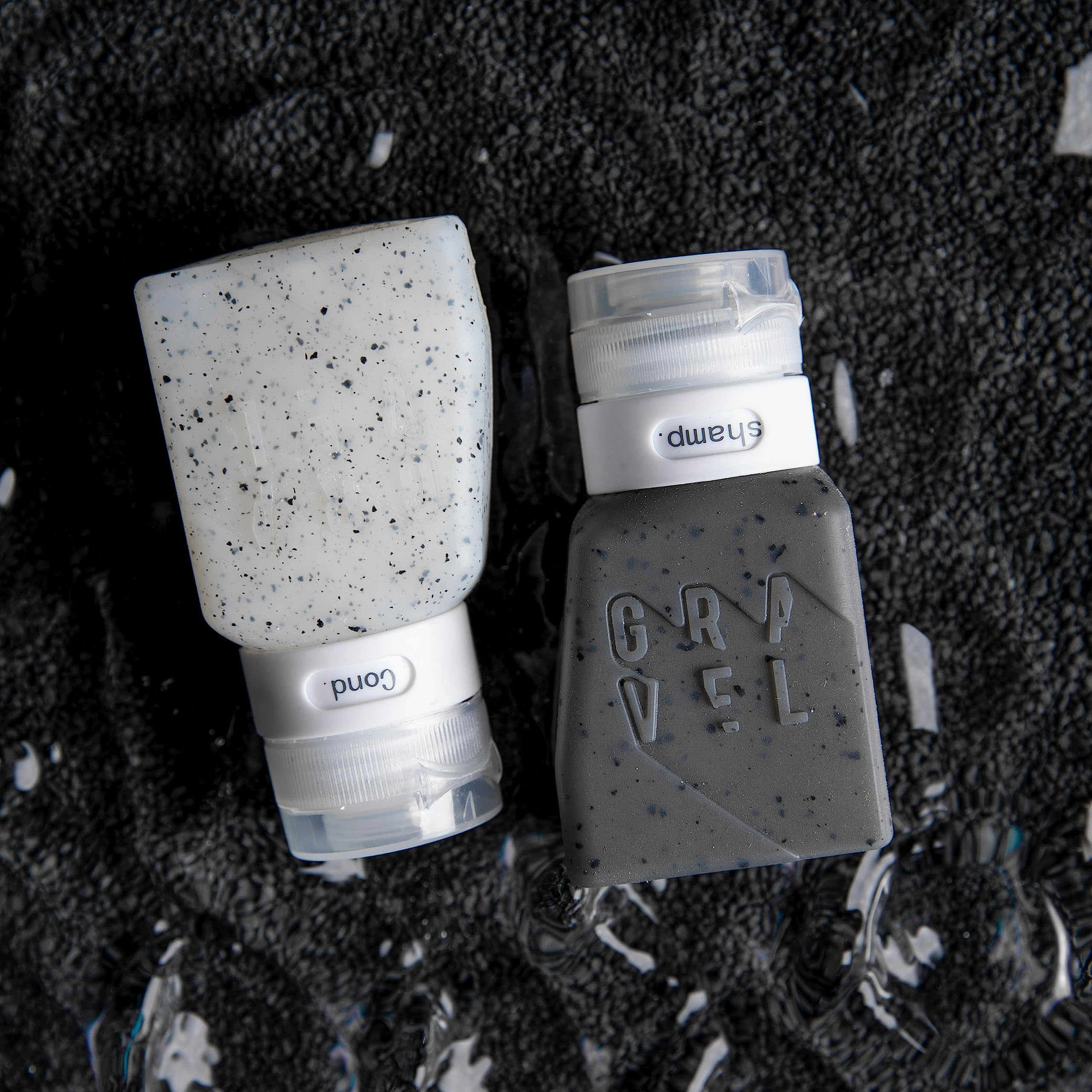 Gravel clear body 3oz bottles showing visible liquid and label tabs for quick identification