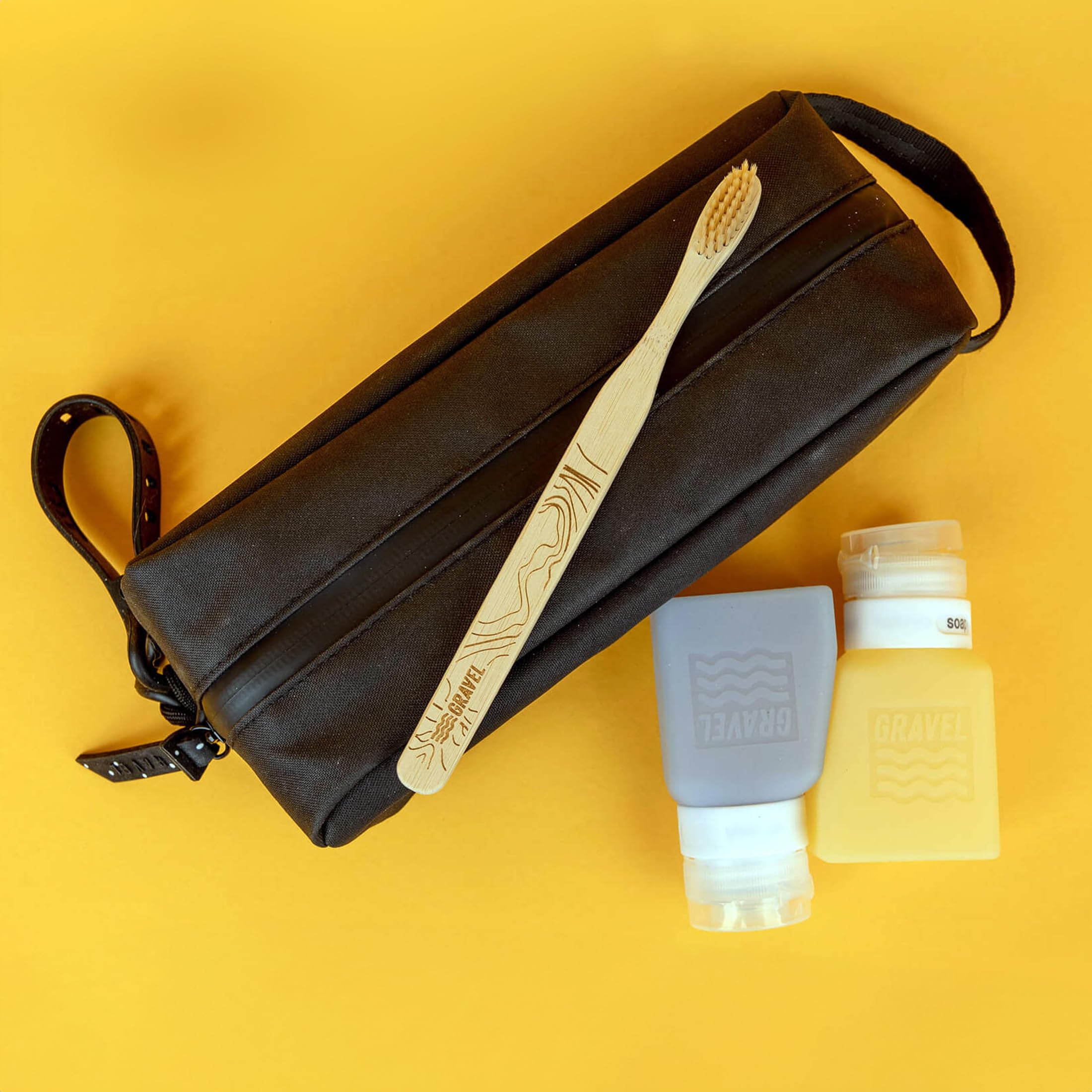 Gravel label system helps identify shampoos and lotions on the go.