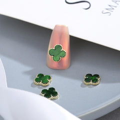 Green Clover nail charms decorative box display for easy decorating ideas.