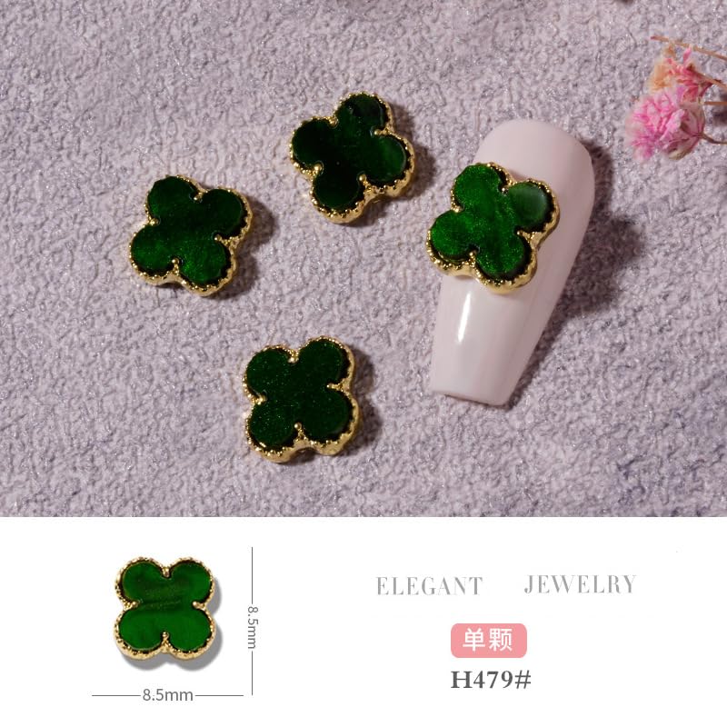 Green Clover nail charms on-nail detail showing rhinestone edge.