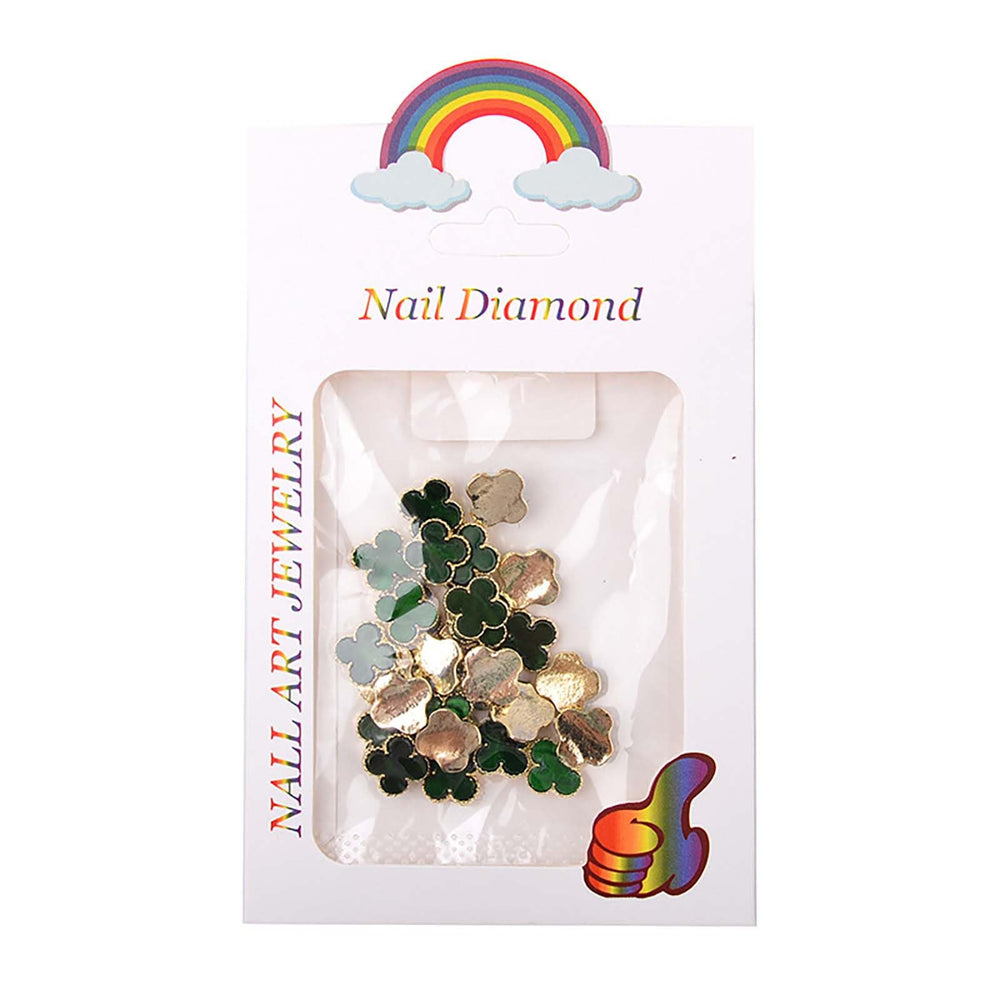 Green Clover nail charms on display with soft lighting for premium manicure ideas.