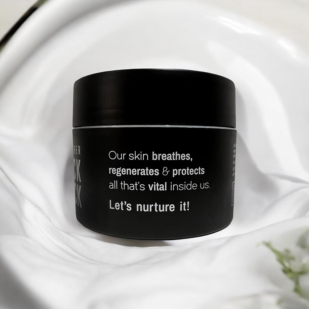 Greyfeather Crack Attack Hand Cream applied to rough working hands after tasks.