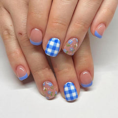 GRITOSE cute press-on nails with blue French tip and floral design for chic at-home styling.