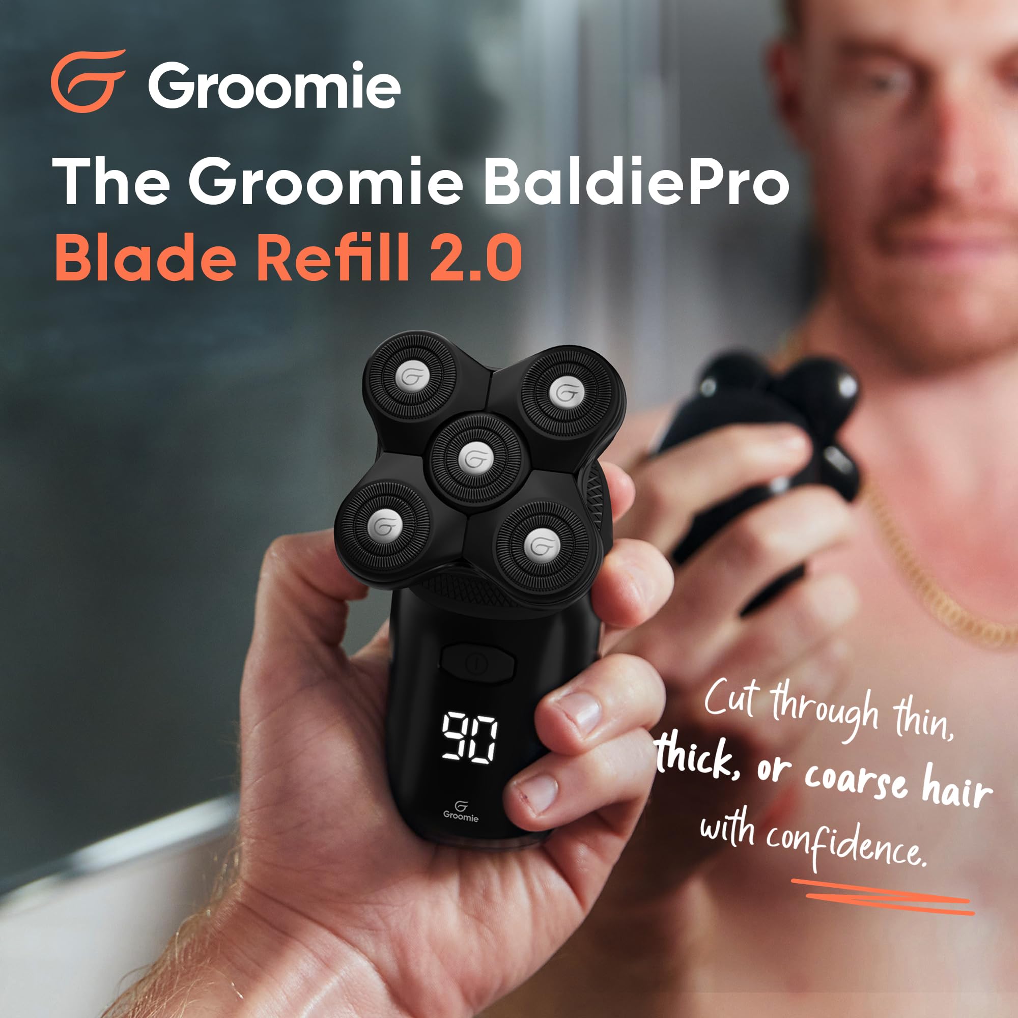Groomie BaldiePro blade refill 2.0 shown being removed for quick maintenance.